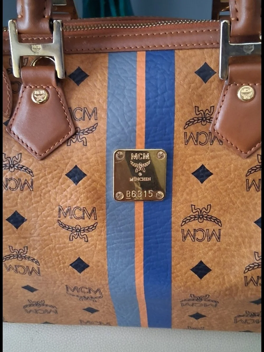 💯Authentic MCM Cognac Visetos Messenger Bag with Blue and Orange Stripes